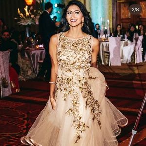 Champagne colored floor length gown. Size 2